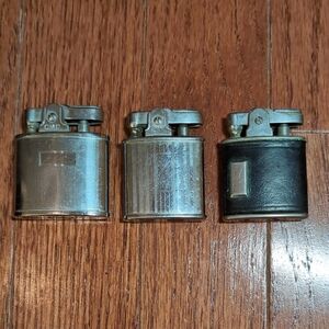 CMC and Ronson Vintage Lighters Two Silver and 1 Black